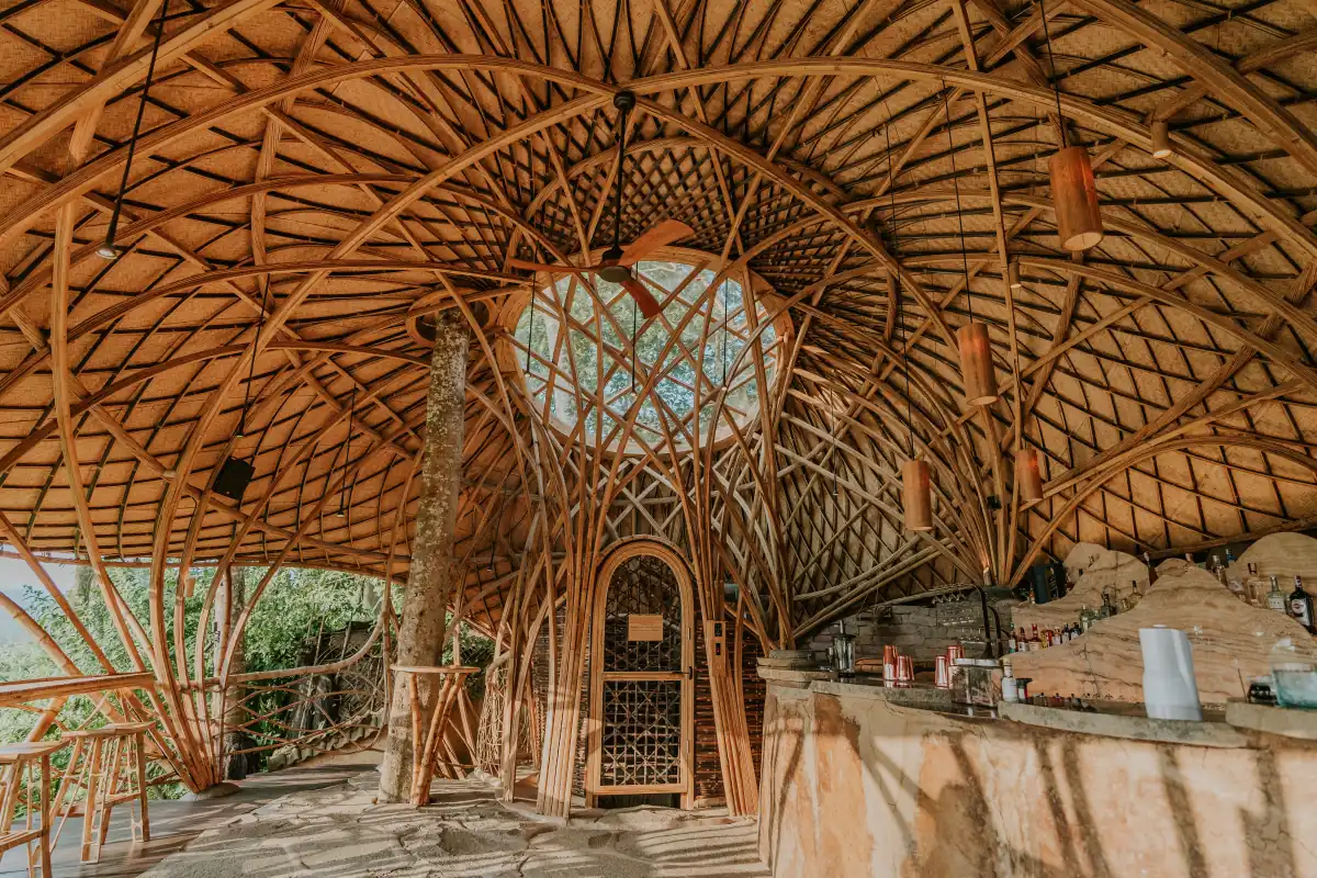 The woven bamboo dome and skylight inside one of Ibuku's bamboo structures at Bambu Indah